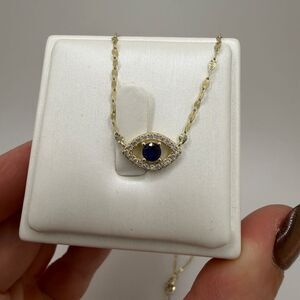 15" gold over 925 evil eye necklace with pave rhinestones and faux sapphire!